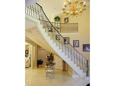 Entry/Foyer. Entry with floating, curved staircase