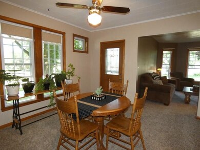 Dining Room (Hardwood Floors under new carpet)