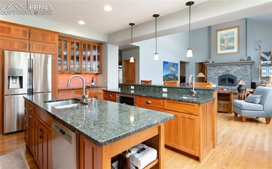 Chef's kitchen w/slab granite countertops