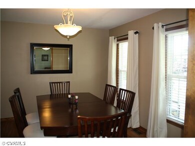 Dining Room - Formal dining room offers neutral co