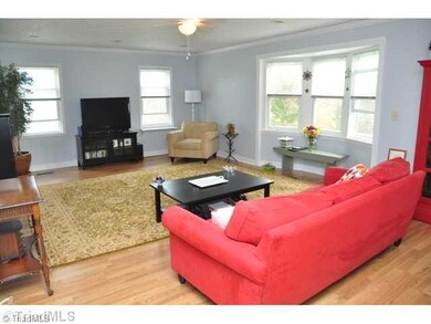 Living Room. Light and airy living room with fireplace for those chilly nights.