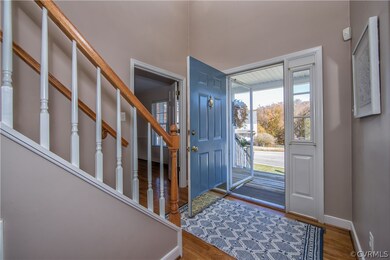 Notice the hardwood floors,  the storm door and si