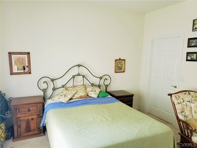 Primary bedroom view of door to 8x6 WIC.  PHOTO FR