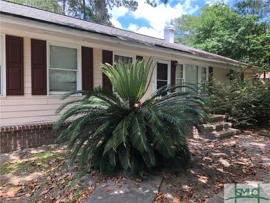 SAGO PALMS, GLORIOUS AZALEAS, AND A WINDING BRICK 