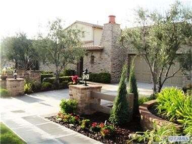 Nicely landscaped front elevation.