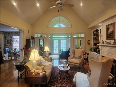 Living area with recessed lighting, wood finished