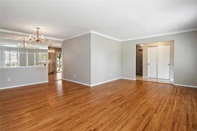 Full view of Living Room and Dining Room with view into the Kitchen