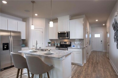 Photo is not of the actual home, but is an inspirational photo of builder’s model home and may depict options, furnishings, and/or decorator features that are not included