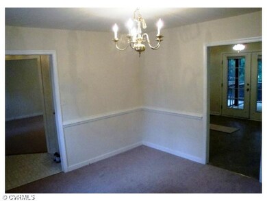 Dining Room - New carpet, fresh paint and chair ra