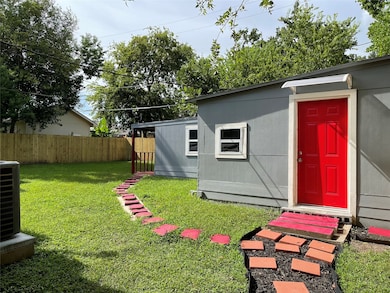 front door to apartment in the back yard