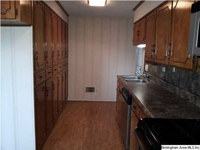 Another view of kitchen with tons of cabinet space