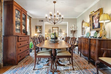 Dining space featuring a chandelier, hardwood / wo