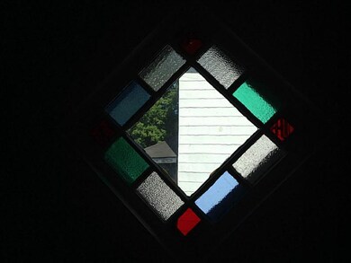 Other. Stairwell stain glass window