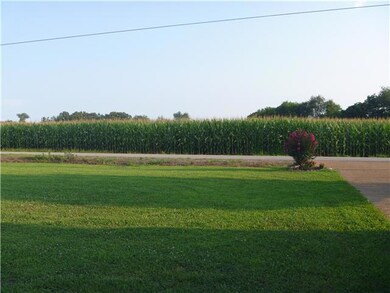 As you step onto the front porch - turn around - this is the view!  Wow!  Farm land and the corn will be harvested soon.