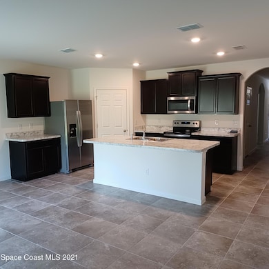 6558 Marble Rd, Sharpes, FL 32927 - photo 2