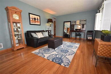 Bright, spacious Living Room with beautiful Hardwo
