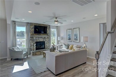 REPRESENTATIVE PHOTOS. Great room features gas fireplace.