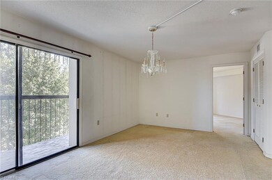 Living room with balcony and large storage closet
