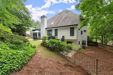 Main level screened porch walks out to backyard.