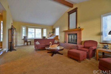 Living Room with fireplace & bay windows