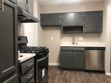Kitchen featuring appliances with stainless steel 