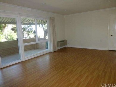 LAMINATE FLOORING, HEAT PUMP -LIVING ROOM, VIEW 
