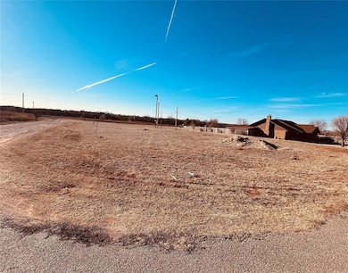 View of yard with a rural view