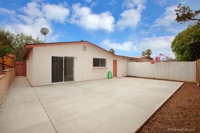 Large, new concrete slab in backyard, ready for entertaining