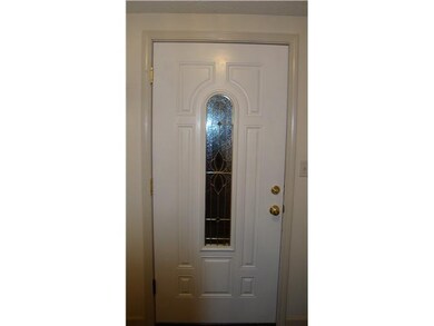 Exterior Front. Beautiful front door leads to larg
