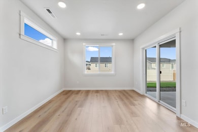 Dining room featuring recessed lighting and light wood-style floors