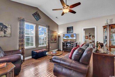 Living room featuring dark hardwood / wood-style f