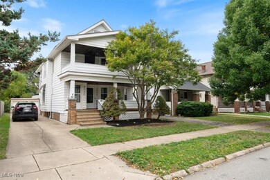 View of front of property featuring a front lawn