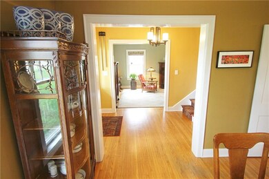 Pass through the gracious foyer into the dining ro