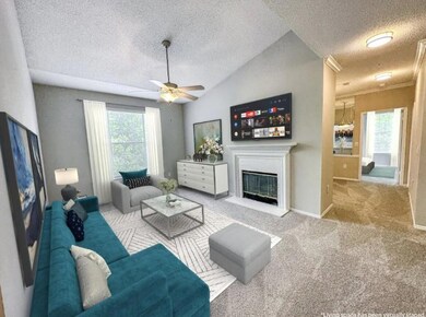 Carpeted living room with ceiling fan, a textured 