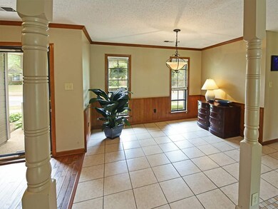 The dining room has an updated look with tiled flo