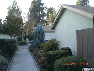 VIEW OF THE SIDE LOOKING TOWARDS GARAGE