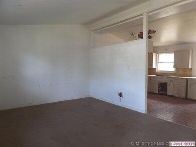 Living room with vaulted ceilings