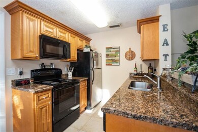 Dual sinks and a stainless refrigerator for your e