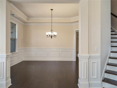 Tray Ceiling and beautiful view to the front yard 