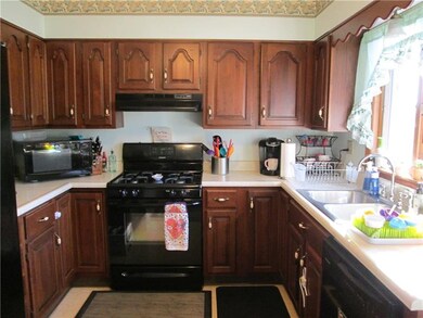 Quality appliances with Cherry cabinets all around