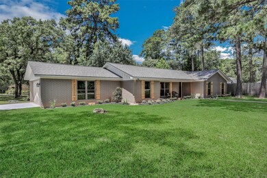 34605 Bernice Dr, Pinehurst, TX 77362 - photo 6