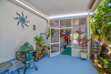 Front entry, screened room 1