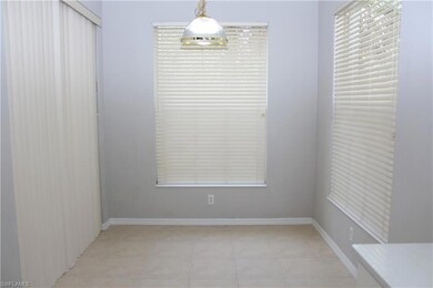 Spare room with light tile patterned floors
