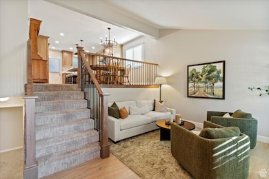 Remodeled Living Space with Laminate Flooring, beautiful new banister.