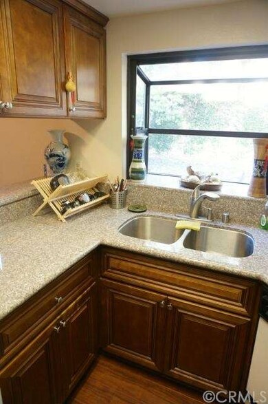 kitchen overlooking serene backyard
