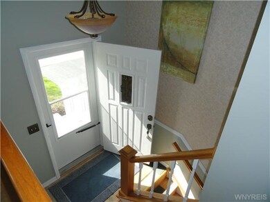 Foyer. BRIGHT FOYER...
