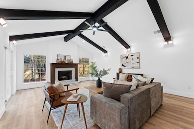 Stunning living area with soaring cathedral ceilin