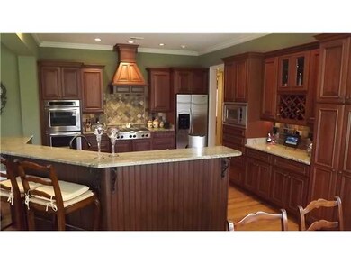 Paula Dean's Dream Kitchen off Family Hearth room.