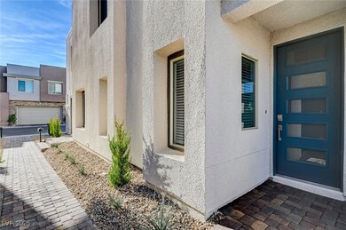 Entrance to property featuring stucco siding