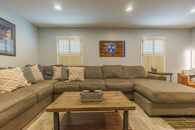 Living room with plenty of natural light, wood-typ